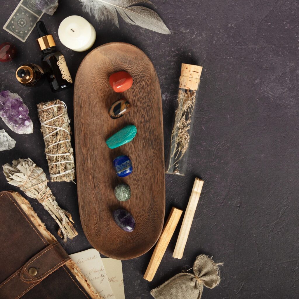 Leather Journal with Crystals, Sage, and Healing Stones on Dark Background